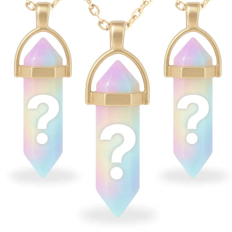 Three gold aura necklaces, each color still a mystery