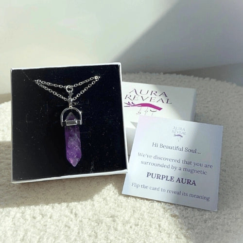 Purple aura necklace in its box with the aura card